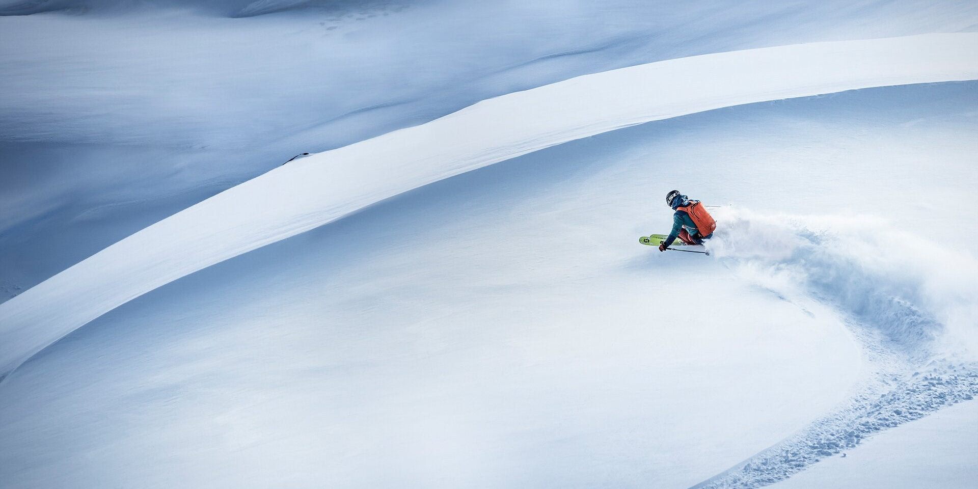 Skier freeriding big mountain terrain